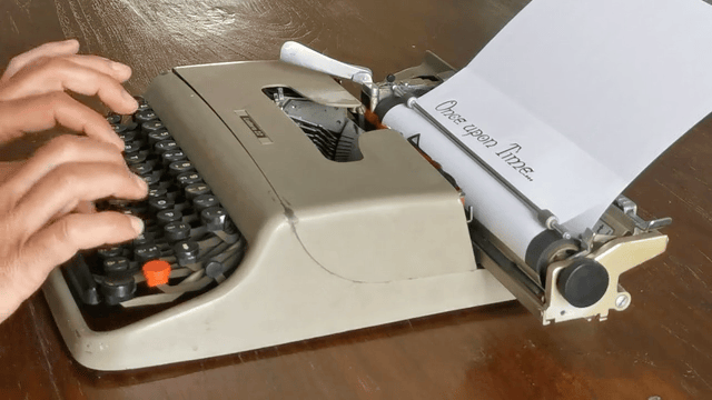 Typewriter key strike